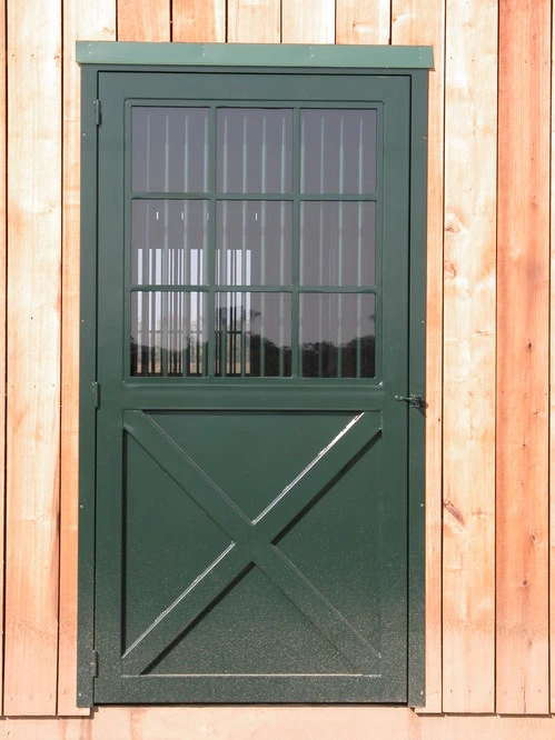 Forest green Dutch door with upper window and X-brace lower panel framed in natural pine