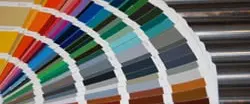 Impeccable Finishes: Color fan deck displaying rainbow spectrum of powder coat finish options from reds through blues and greens to grays